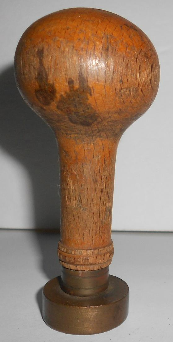 Railway Express Wax Sealer North Tonawanda, NY: A round head brass wax sealer made for the Railway Express Agency and used by agent #1 in North Tonawanda, New York. Fine blond wooden handle. The last image is inverted like a mirror so it's easier t