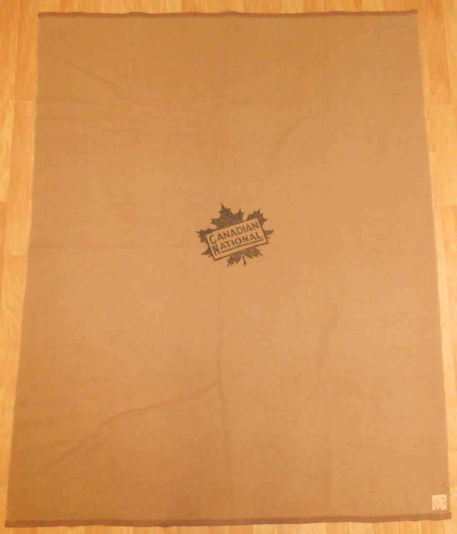 Canadian National Railway "Maple Leaf" Blanket by Hurn Bros.: A thick wool blanked made by Hurn Brothers in Canada for the Canadian National Railway. It measures 52" by 76" and it has a nice maple leaf logo in the center. The Hurn Brothers label is just OK condi