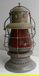 Fitchburg Railroad Thompson Triple Marked Lantern - Red Cast FRR Globe: A Thompson patent single piece frame with pinch pot marked FITCHBURG R. R. in ornate weathering on the lid. It has has FITCHBURG RR is smaller lettering on the skirt. This lantern does not have the 18