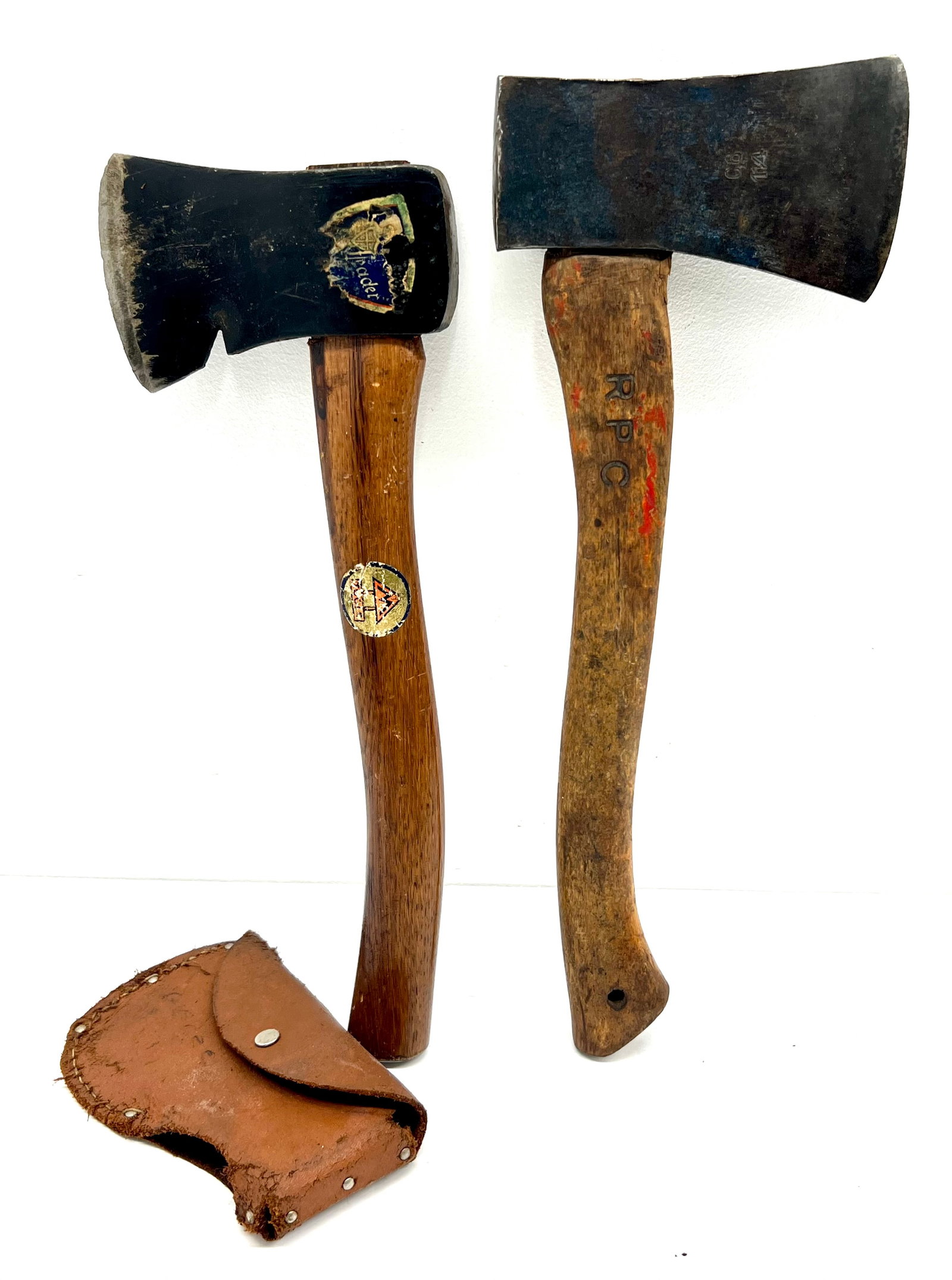 Pair of Hatchets: Pair of Hatchets One with Label Remnants other made in Sweden