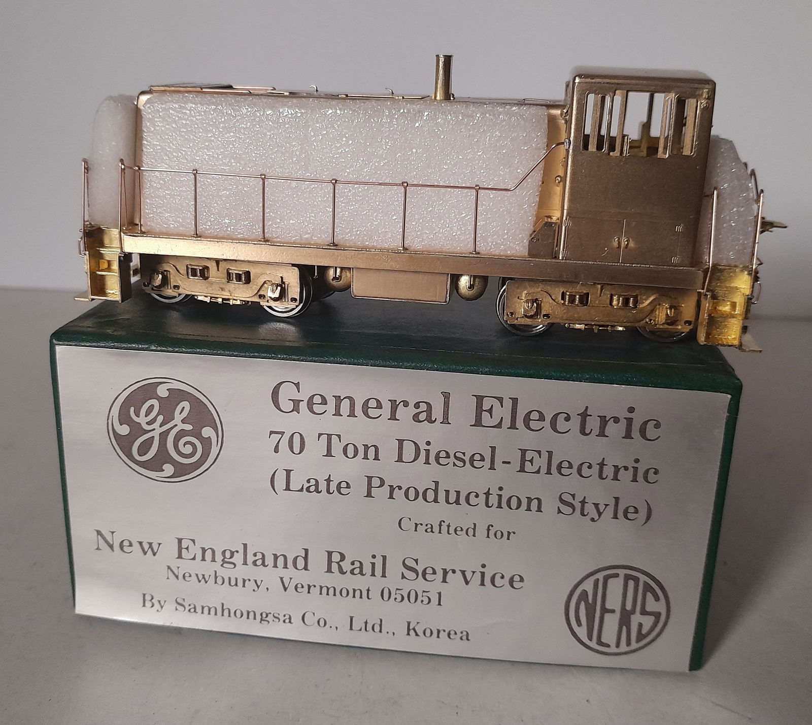 HO Brass - NERS GE 70 Ton Diesel Locomotive (Late): HO scale brass - New England Rail Service import of a late version General Electric 70 ton diesel locomotive. Made by Samhongsa in Korea. I left the rail foams on, the less handling the better. Not ev