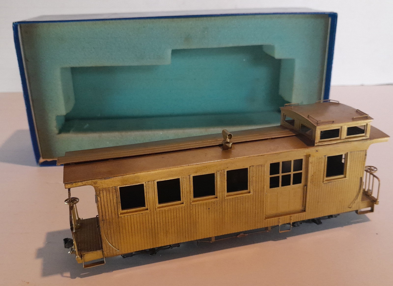 On2 Brass NJCB - Sandy River & Rangeley Lakes Caboose #556: On2 brass model by NJ Custom Brass of Sandy River & Rangeley Lakes Railroad caboose #556. This is a narrow gauge (2 foot) model in 1:48 scale. This is NOT On30. This model is unpainted and shows some 