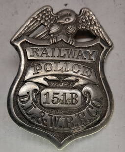 DL&W RR Police Badge #151B American Ry Supply Co.: A police breast badge made for the Delaware Lackawanna & Western Railroad by the American Railway Company in New York. It has number 151B in the panel on the front and the American Ry Supply Company