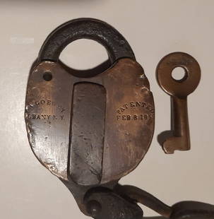 J.A. Goewey - Brass Lock & S&M Key: J.A. Goewey has an 1859 patent. They were located in Albany, NY and seems like they sold exclusively to the New York Central Railroad. . This lock has a dust cover spring that does not operate. It doe