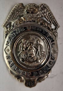 Maine Central Railroad Police Badge #17: A breast badge made for eth Maine Central Railroad with small #17 at 6:00. It measures about 1 1/2" by 2 1/2".