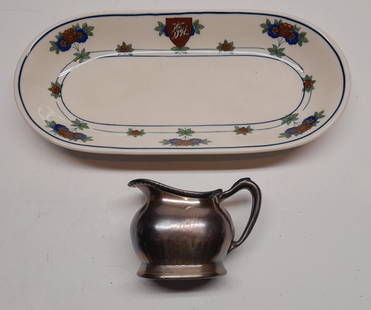 Delaware & Hudson (2) China Celery Tray, Silver Creamer: Delaware & Hudson Company dining car(2): China "Canterbury" celery tray measures 9 3/4" by 4 1/2". crows foot crack on reverse, Silverplated coffee creamer with D&H logo on the side and Delaware & Hud