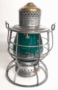 NYLE&W RR Brasstop Wire Bottom Lantern Green Cast: A fine Railroad Signal Lamp & Lantern frame with brass top and manufacturer's name embossed. It also has the May 1889 patent date stamped near the base. It has a twist off base using a leaf spring.