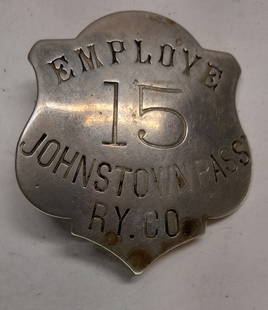 Johnstown Passenger Railway Company Badge #15: An older street railway badge from Pennsylvania that predates the 1889 flood. The line was originally horse run and after the flood was rebuilt as an electric line. A pretty obscure bade and it is #15