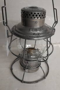 Erie Railroad Reliable Lantern odd Erie RR Cast Globe: Interesting Adlake Reliable frame with twist off base that is not common. Lid is stamped ERIE R.R. with a faint serial number of 1512 in the panel. An exceptionally clean Phil Simms lantern. The globe