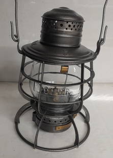 CNE RY Armspear Lantern Clear Cast CNE Ry Globe: An Armspear tall frame with twist off 1897 base. The lid is nicely stamped CNE RY for the Central New England Railway. The frame has flat verticals and one flat horizontal above a round horizontal. Th