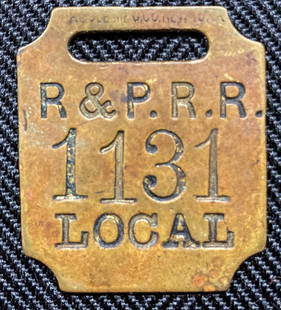 Rochester & Pittsburgh Railroad Baggage Tag (BR&P): A Hoole Manufacturing brass baggage tag made for the Rochester & Pittsburgh Railroad. This is a "Local" tag meaning the passenger was not leaving eh R&P trackage. It is serial number 1131 and it is si