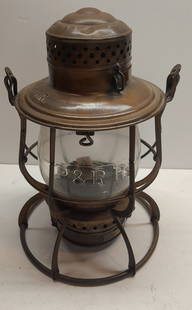 P&R RR Armspear '89 Lantern P&R RY Fancy Cast Globe: An older Armspear lantern frame with a twist off base and 1897 patent. The lid is stamped P&R RR for the Philadelphia & Reading Railroad. which is an older marking. The globe is cast P&R Ry with no pa