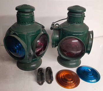 Pair of BR&P Marker Lamps with mounting brackets: Old green paint on this set of Buffalo Rochester & Pittsburgh Railway marker lamps. 2 lenses are loose on one lamp. The mounting brackets also have the same green paint. Nice to get them as a pair wit