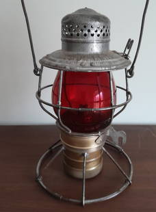 Monon Route Tall Handlan Lantern - unique base, Red Unmarked EB Globe: An older Handlan lantern with bail lock down on lid. 5 digit serial number opposite MONON ROUTE on the lid. The removeable pot is threaded and does come off. It has one mounting bracket off the base.
