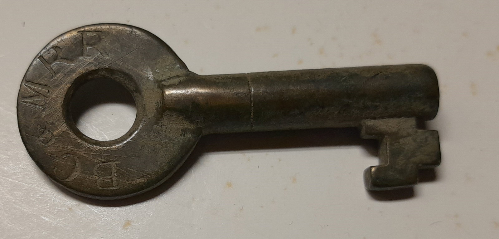 Boston Concord & Montreal Railroad Steel Switch Key: Bohannan made this steel switch key for the Boston Concord & Montreal Railroad. It has the railroad initials on one side and the Bohannan hallmark and an "S" on the reverse. Standard bit coming down a