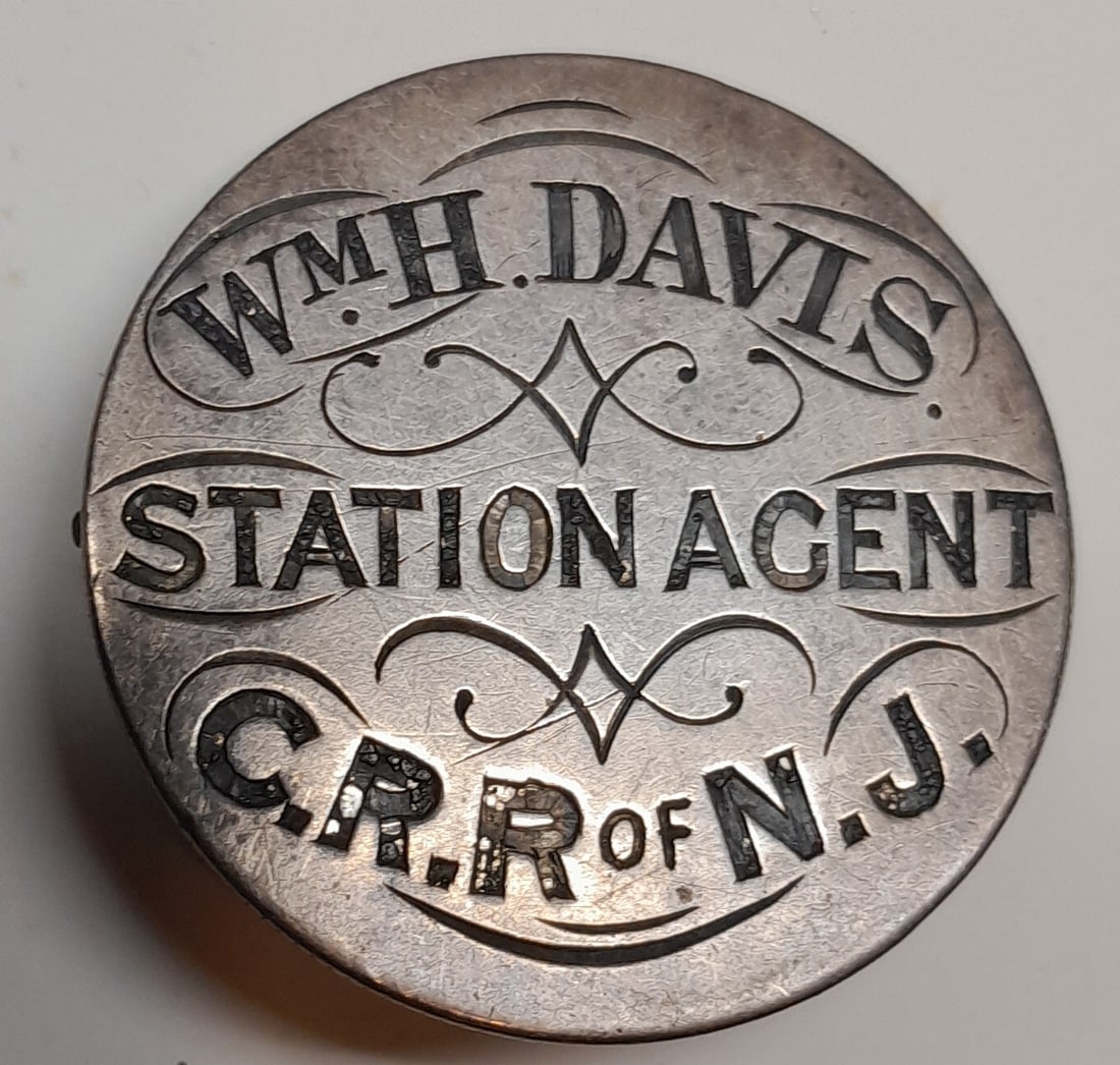 Wm. H. Davis Station Agent C.R.R.of N.J. - Silver Coin Badge (1 of 2)