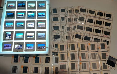 240 Photo Slides - Diesel Locomotives Mainline: About 240 photographic slides of Class 1 railroad diesel locomotives. 12 plastic sleeve sheets with 20 slides in each sheet. Note photos through the plastic distort both image and color.