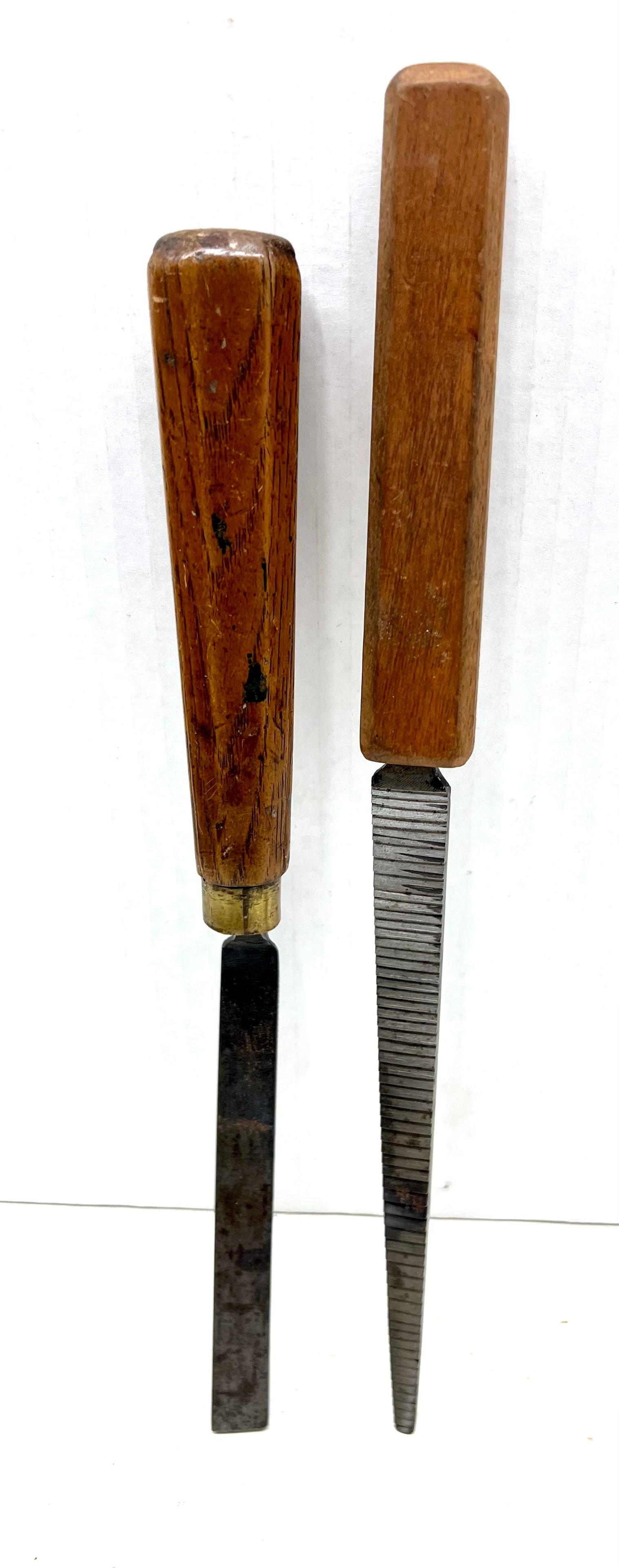 Two older floats: Two older floats; one cranked (with loose handle), other tapered, longest 13".