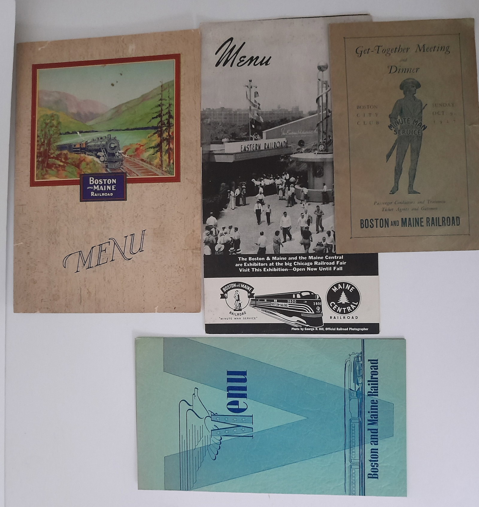 Boston & Maine Railroad Menus (4): 4 menus from the Boston & Maine Railroad Various dates and formats. One colorful 1930 issue, a 1948 Fair and a 1945 from September 1. with WWII theme. Condition varies.