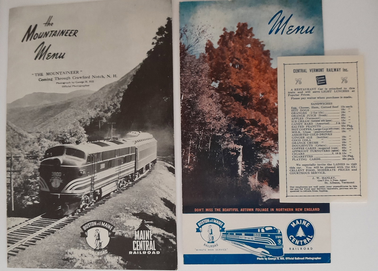 Boston & Maine & Central Vermont Menus (2): 2 menus from the Boston & Maine Railroad post WWII with Maine Central included One Central Vermont coach seat teaser., placed on coach seats to entice customers to use the diner. Condition varies.