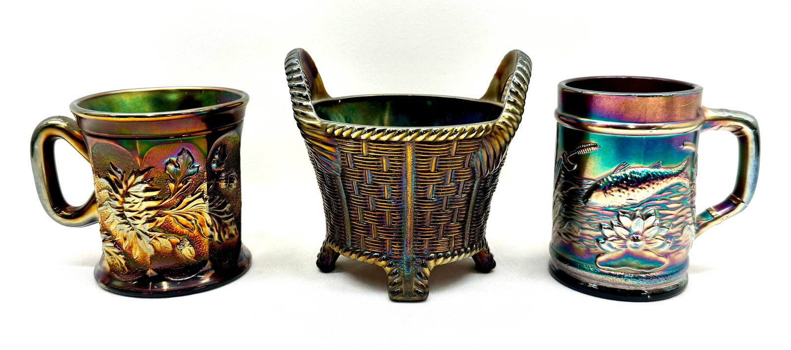 Carnival Glass: Three Nice Carnival Glass Pieces Fish Mug by Dugan Glass Co. Dandelion Mug by Northwood. and Northwood Basket.