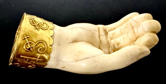 Carved Hand With Gold Cuff