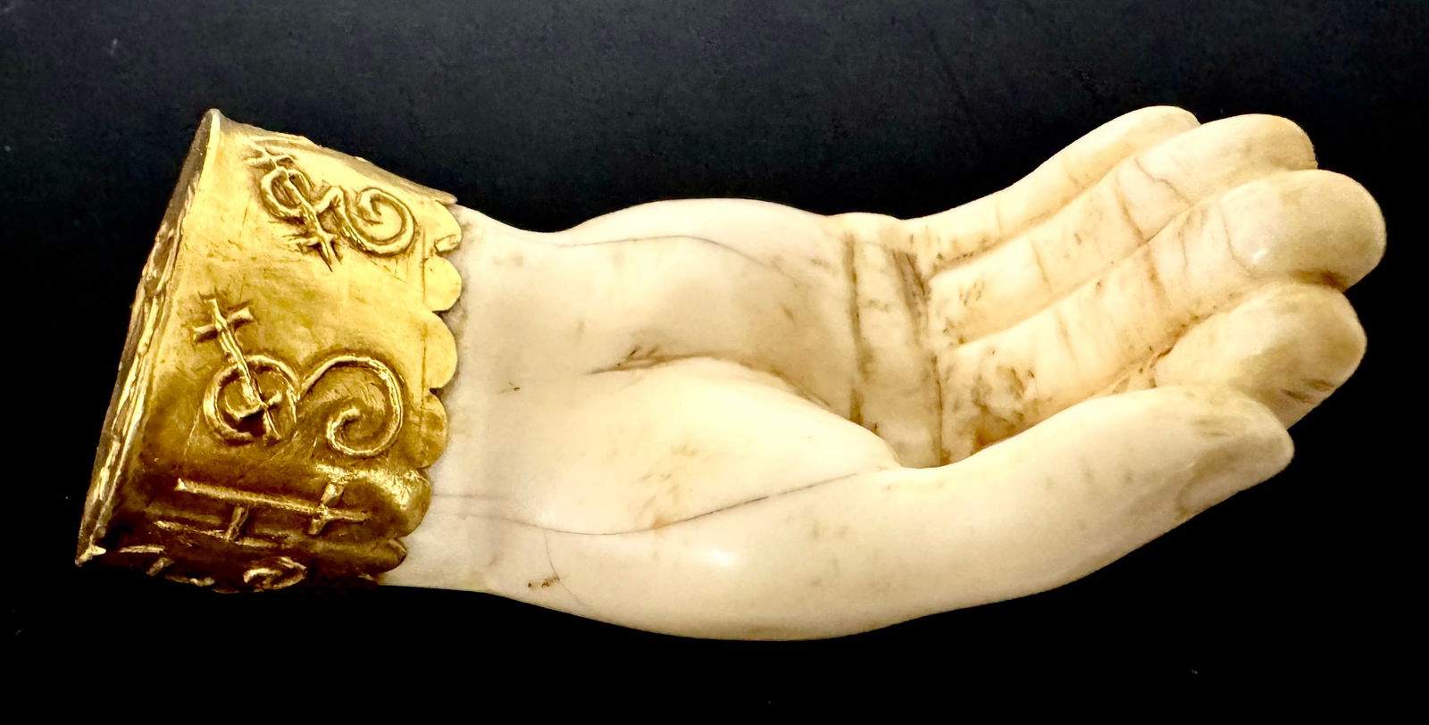 Carved Hand With Gold Cuff (1 of 9)