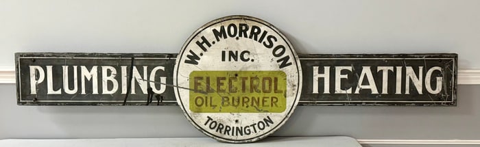 Seven Foot Metal Over Wood Plumbing Heating Sign