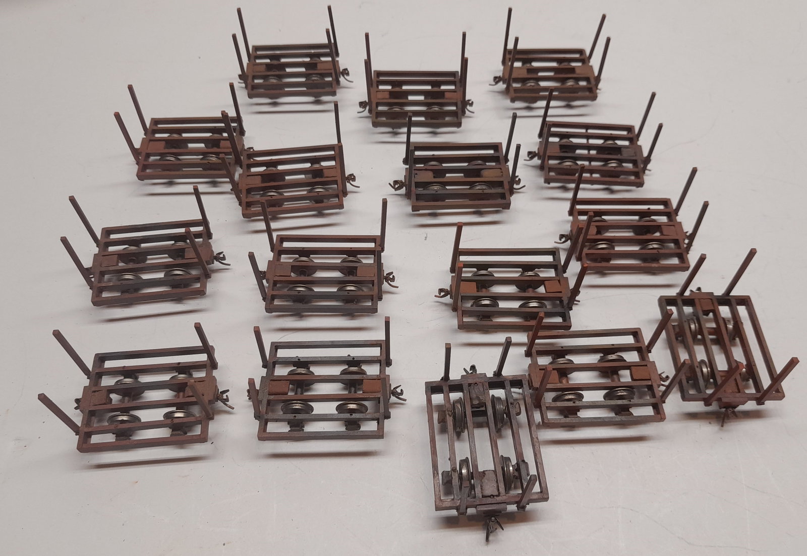 On2 Small Plantation Cars (16) Stake Bed Flats: On2 Plantation cars. Very small flat cars with stakes. Nicely built and an instant fleet of 16 pieces. No boxes.