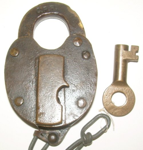 Canadian Pacific RY Brass Lock with Key: Canadian Pacific brass lock stamped "CPR". Comes with CPR marked key and a modern era chain. Nice dust cover spring. Very Good condition.