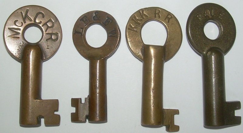4 Brass Switch Keys: PA, NY, Ind: 4 brass Switch keys: "McKC RR" - McKeesport Connecting (near Pittsburg) nice "792" on reverse. Looks like a Fraim. "LE&FW" Lake Erie & Fort Wayne - nice Bohannan hallmark with "S" on reverse. "KKK" sh