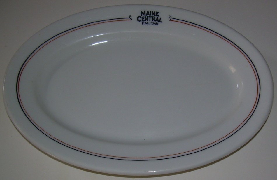 Maine Central "Kennebec" China Platter: Maine Central Railroad "Kennebec" pattern platter - A clean 8 1/4" by 5 3/4". It sits flatter than the "Bangor" platters. No damage, just some typical knife marks. Made by Syracuse (OPCo) with a date