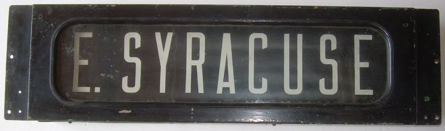 Metal Roll Sign from Syracuse New York: Syracuse, New York Roll Sign. Bus or Trolley. Locations include: E. Syracuse, Minoa, West Solvay, etc. All Metal: 28" wide not including mounting brackets, 8" high, 5" deep. Stainless steel turning kn