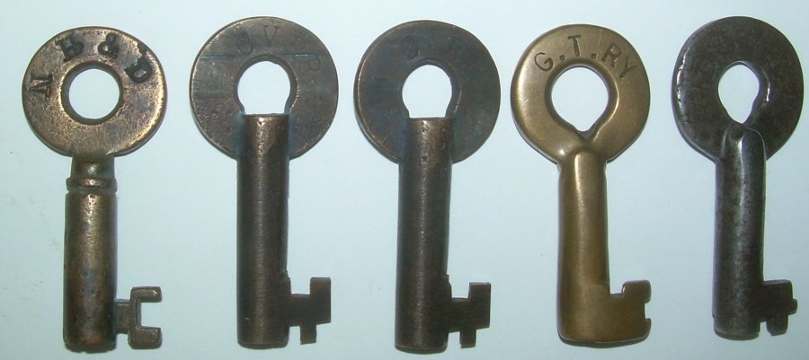 5 Brass Switch Keys: New England: 5 New England based Switch keys: #1 is New Haven & Derby with an unusual taper and ring to hilt. No maker. #2-3 Central Vermont with earlier "RR" both a Slaymakers but not marked. Standard Central Ver