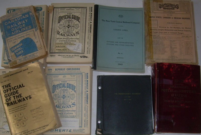 10 Reference Books: Official Guides, PRR, NYC: A thick stack of books that includes: 1928 Bullingers Shipping Guide (rough cover), 1945 Pennsylvania RR List of Stations & Sidings, Official Guide (Canada) 1951, NYC 1943 Officers, representatives, S