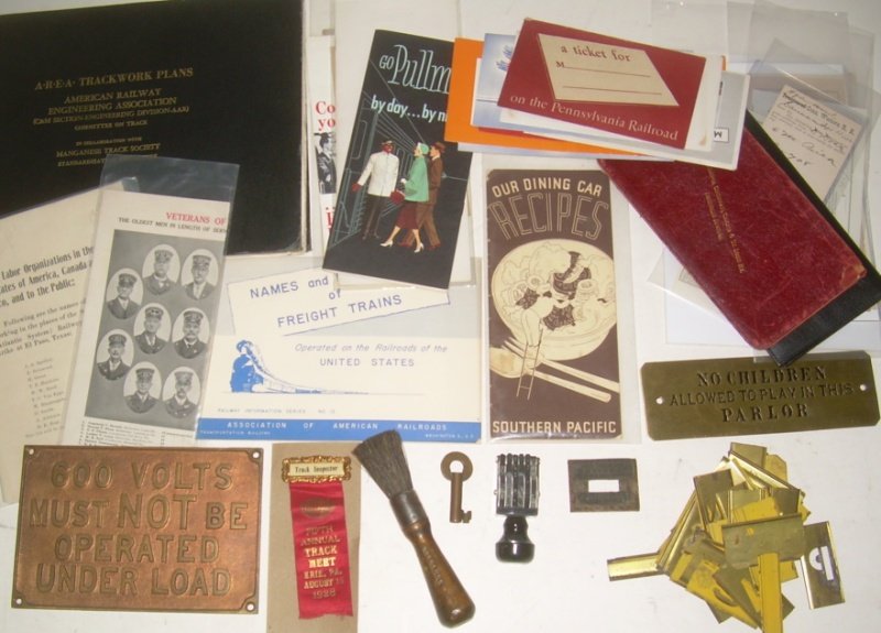 Eclectic: Hardware, Catalog, Dining Car: This lot includes several interesting items: 600 Volt Brass sign, Parlor Car Warning Sign, New Haven Brush, New Haven "Received" Stamp die, MoPac switch key, a pile of letter and number stencils, SP D