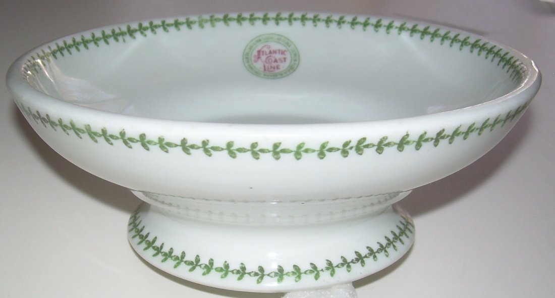 Atlantic Coast Line – Palmetto Footed Compote: A footed compote in the “Palmetto” pattern for the Atlantic Coast Line. Measures 6 3/4” diameter and 2 1/2” tall. Wonderful McNichol backstamp with Barth and Liberty China. The ACL logo with a