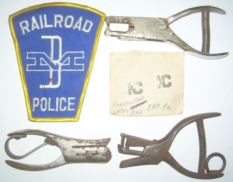 Employee Related Items: IC, B&M Ticket Punches: A group of items that includes: Boston & Maine Police patch, Illinois Central lapel pins , 3 ticket punches that are all different