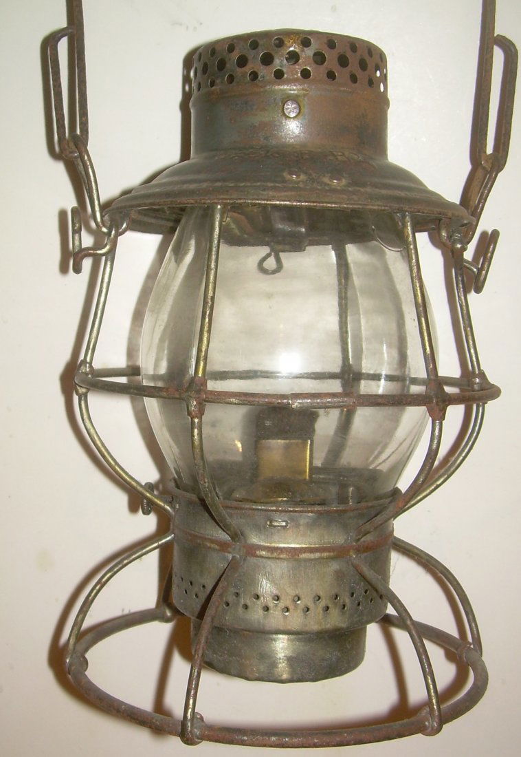 Georgia Southern & Florida Railroad Lantern: Hard to find Southeastern lantern that is stamped GS&F RY on the lid. The frame was once cleaned and now shows sights of return surface rust. It would clean up again. The Georgia Southern & Florida Ra
