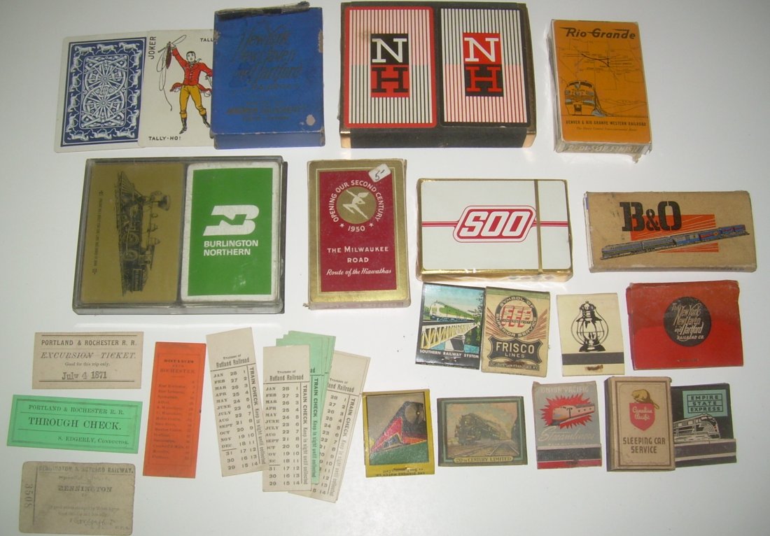 Playing Cards, Matches, Seat Checks: Several groups of playing cards that include: New Haven "Andrew Dougherty" blue deck that I have never seen, double NH deck, Milwaukee Road, more. 11 matchbooks with some early color ones and a box of