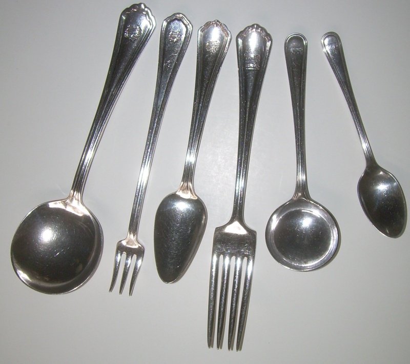 Canadian Silver Flatware (6) 4 CN, 2 CP: A nice group with some unusual pieces. Older pieces. (1) Canadian National Cream Soup (large bowl) spoon 6 3/4", Maple Leaf logo made by International Silver (2) Canadian National cocktail fork 6 1/2"