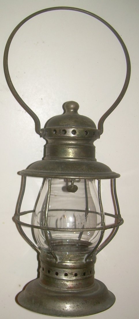 Conductor Lantern with Old English Cut Globe: Incomplete Conductor lantern - no threaded fount. Nickel plated with no dents or damage. The globe is a very nice Old English cut "TCW". The globe is free blown and has nice swirls. The size is 4 5/8"
