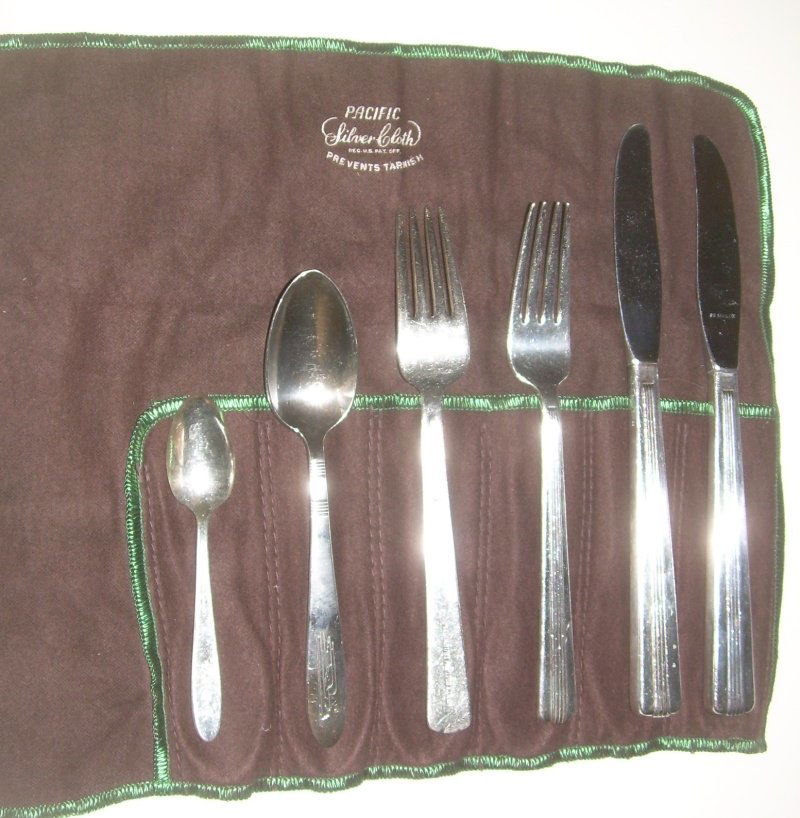 UP and MoPac Silver Flatware (6): 4 pieces of Missouri Pacific: 2 pairs of a 7" fork and a 8 1/4" knives. The forks have a clear marking. The knifes have a small name spelled out on the edge of the hollow handle. The Union Pacific spo