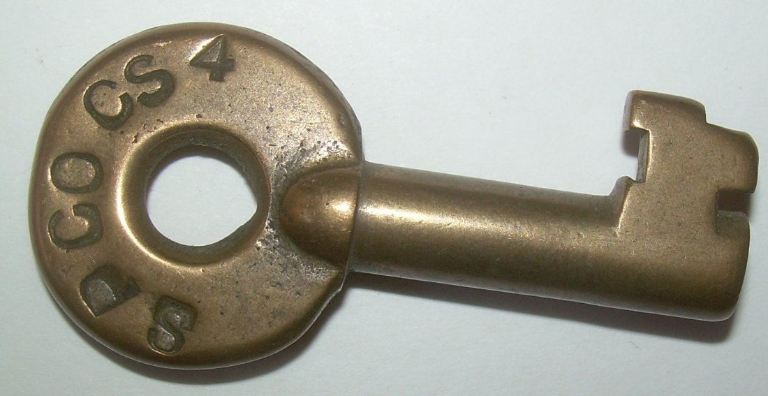 Southern Pacific Co. CS-4 Switch Key: Southern Pacific Railroad - "CS-4" brass switch key with ADLAKE in an arc and an "S" on reverse.