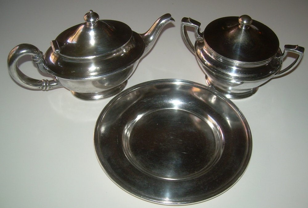 New Haven Silver - Sugar, Coffee, Tray: All different manufacturers on 3 pieces of NYNH&H holloware: (1) Base plate 7 1/4" diameter with an inset of 4" for something to sit in made by Reed & Barton, Good (2) Coffee made by Gorham with a hat