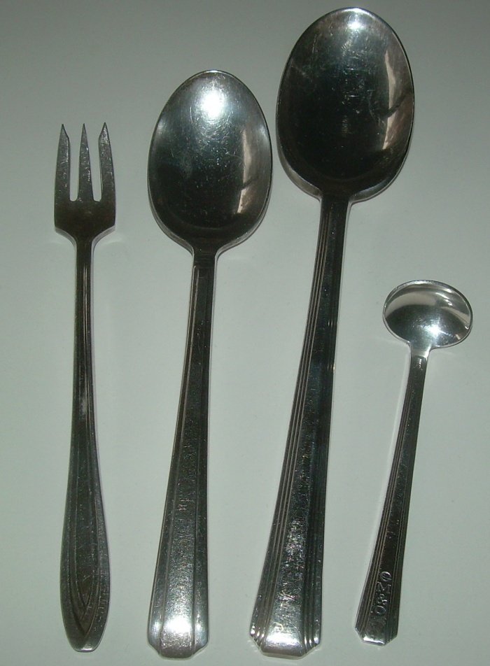 Dining Car Silver: GM&O, IC, CMStP&P: This group of 4 pieces has a wonderful Gulf Mobile & Ohio top marked mustard spoon made by International. There are 2 Illinois Central pieces: cocktail fork (International) and iced tea spoon (Wallace
