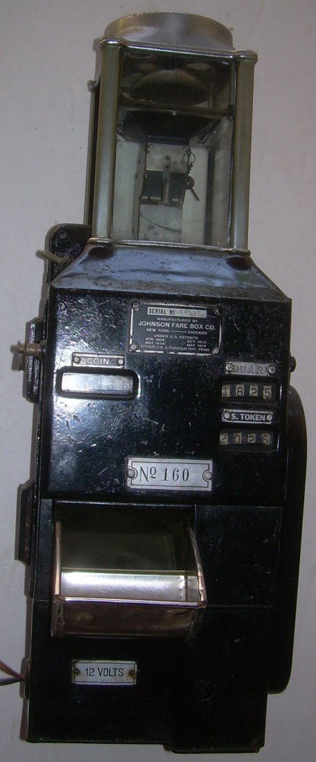 * Johnson Fare Box #160 23" Tall: A heavy Johnson Fare Box. It has a plate with No 160 on the front. It has a serial number of "69525" stamped on a small plate. It has separate counters for Coins, Quarters and Tokens. It's tall at 23"