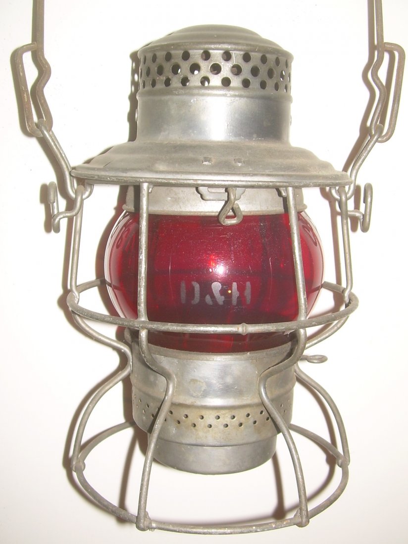 Delaware & Hudson Lantern Red Etched Globe: Adlake Kero Lantern with D&HRR stamped in small initials on the lid. The top has an old price sticker. Label. The frame is complete and solid. The frame has a date code of 4-34 for the 4th quarter of 
