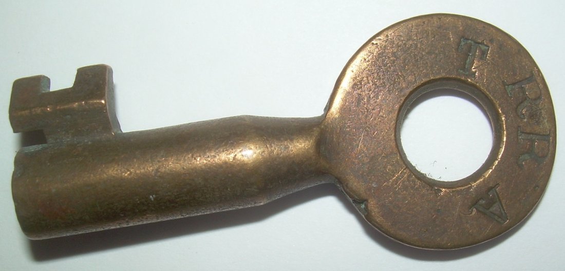 Terminal RR Association Tapered Barrel Switch Key: The TRRA marking is associated with the Terminal Railroad Association in St Louis. This was a junction point that required a local authority to manage all of the service in the immediate St Louis area