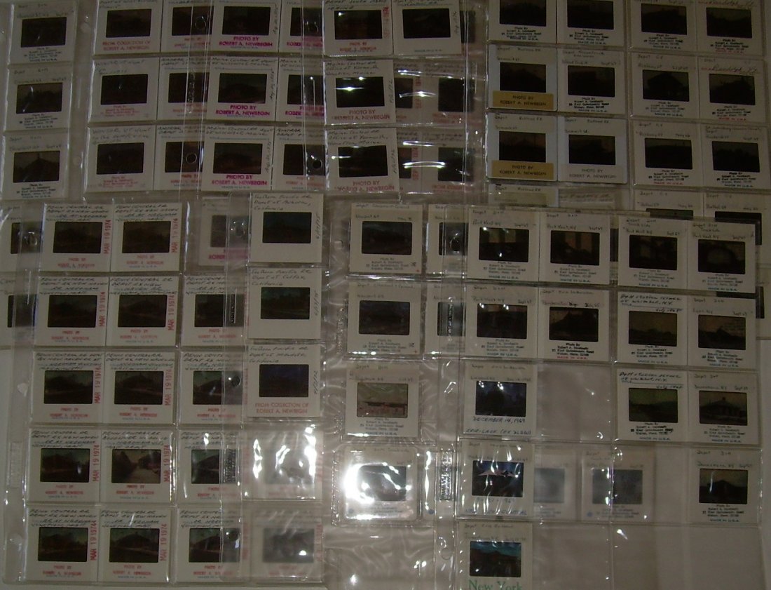 Photo Slides – Depots Originals (115) Mixed: Railroad depots slide originals 35mm color – They have captions. They date from 1966-1978. There are several pages of plastic sleeves with various railroads represented: New Haven (PC era), C&NW, ME